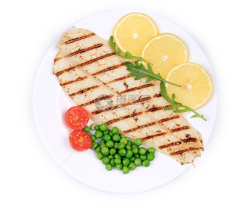 带蔬菜的炸鱼片鳟鱼炙烤鳕鱼盘子用餐正方形柠檬油炸午餐食物图片