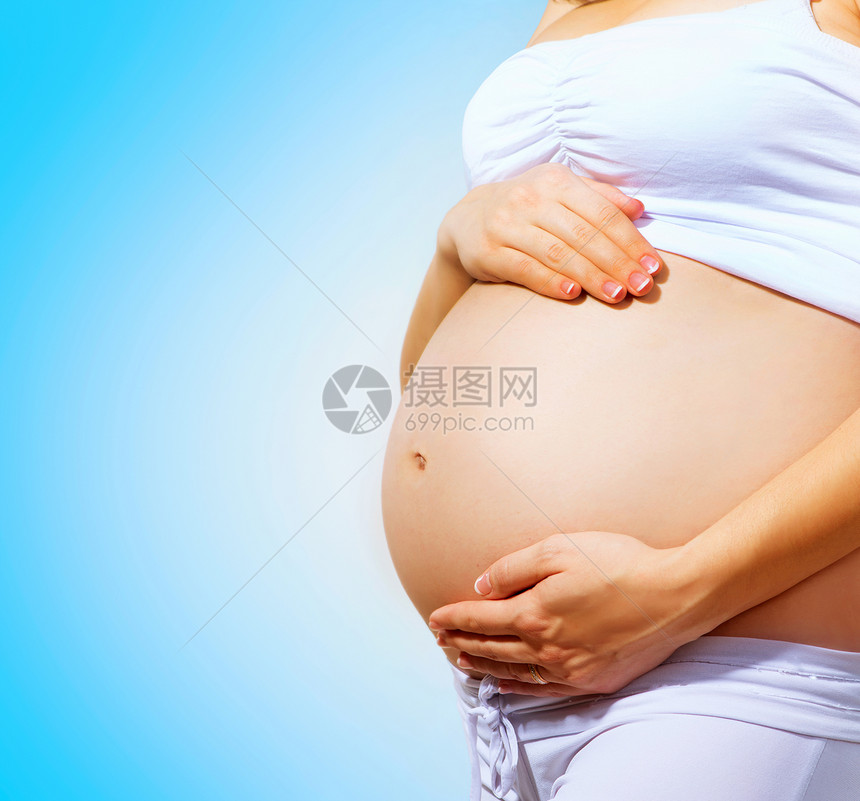 怀孕妇女贝莉 怀孕概念肚子蓝色新生活妈妈父母腹部婴儿孩子母亲母性图片