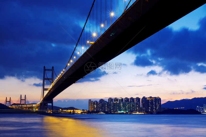 香港长桥 日出时在红东天际晴天场景港口阳光旅游橙子日落海滩海洋图片