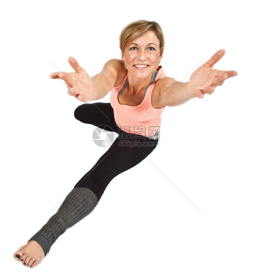 坐在与世隔绝的白色背景上伸展着女士柔软度运动健身房体操女孩姿势乐趣工作室锻炼图片