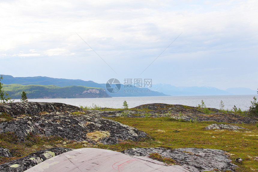 Alta的岩石雕刻红色石头资源遗产历史峡湾天空露天雕刻品雕刻图片