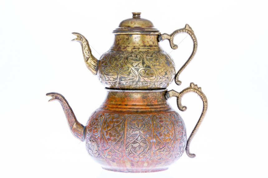 古董风格雕刻的铜土耳茶壶图片