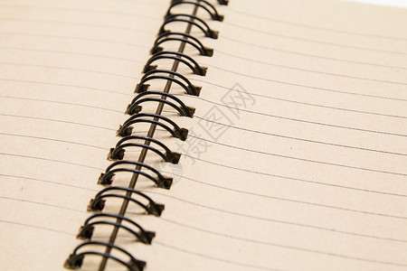 螺旋笔记本工具金属软垫日记笔记纸培训回收组织杂志企业背景图片