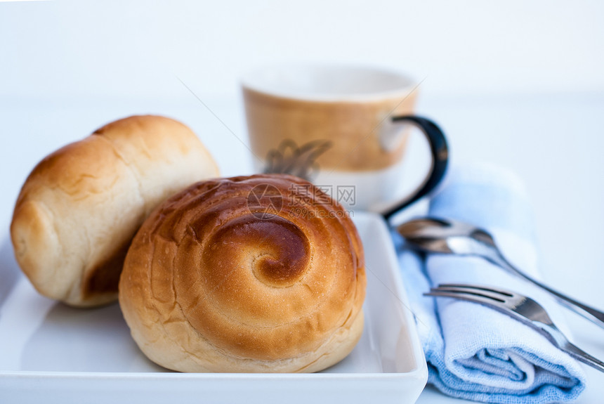 培根面包用餐食物包子咖啡小吃勺子杯子面团圆圈茶点图片