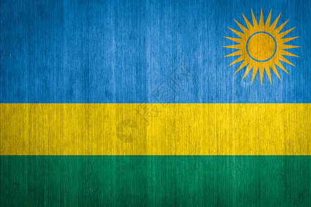 小旗帜卢旺达在木材背景上的旗帜背景