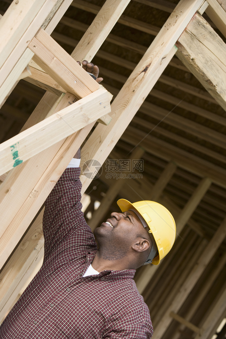 建筑施工工人测量大楼建设框架服装技术验船师安全帽职业头肩建筑工人结构中年图片