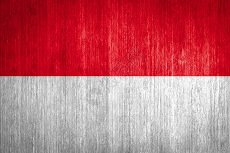 印度尼西亚在木本背景上的旗帜背景图片