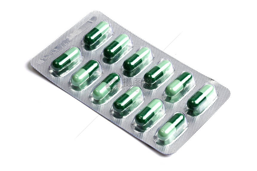 白色隔离的一包绿色胶囊药品医院药片店铺宏观治疗药剂团体疾病医疗图片