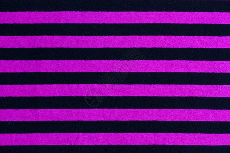 粉色和黑色条纹织物的丝质装饰品宏观材料装饰纺织品艺术墙纸风格背景图片