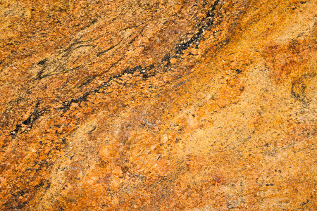 大理石灰色地面地质学橙子宏观柜台花岗岩岩石石头平板背景图片