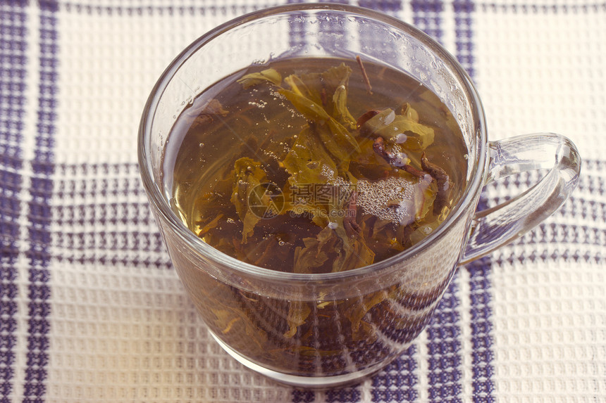 绿叶茶草本植物金子食物饮料芳香盘子热饮液体飞碟早餐图片