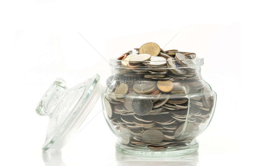 玻璃罐里有盖子的浴器硬币收藏基金玻璃货币账单教育退休白色金融储蓄图片