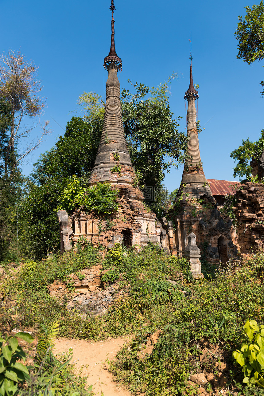 缅甸古老佛教寺庙的废墟衬套纪念碑历史吸引力佛教徒入口植物遗产文化艺术图片