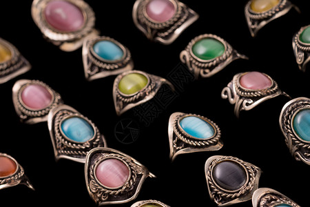 秘鲁环收藏产品背景猫眼玻璃戒指工作室团体女士黑色珠宝背景图片