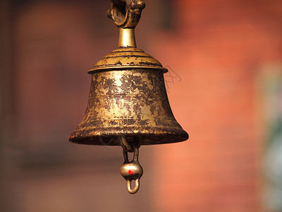 尼泊尔钟铜铃佛塔车轮金属天空祷告车削宗教神社金子太阳背景