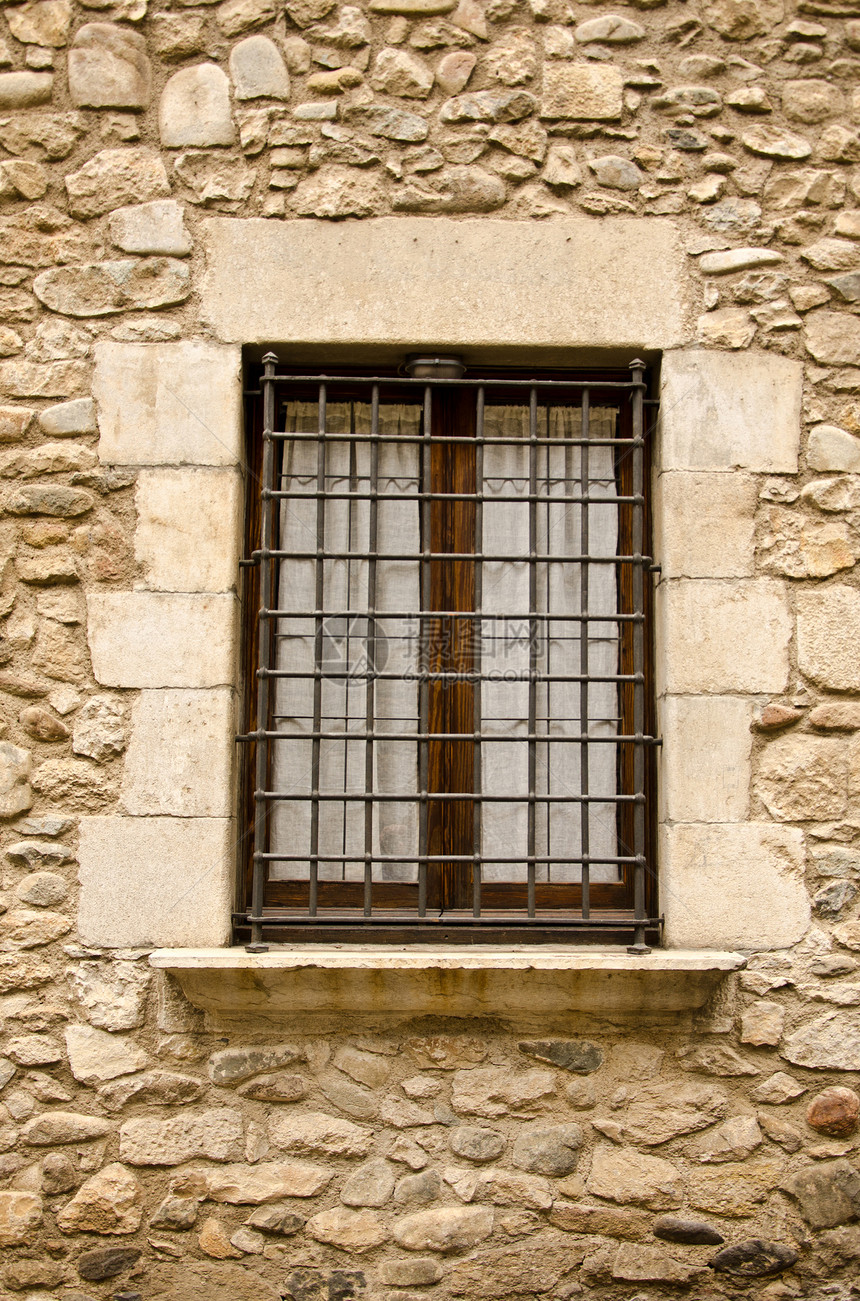 有窗口的旧墙酒吧住房分支机构石头玻璃建筑学窗户图片