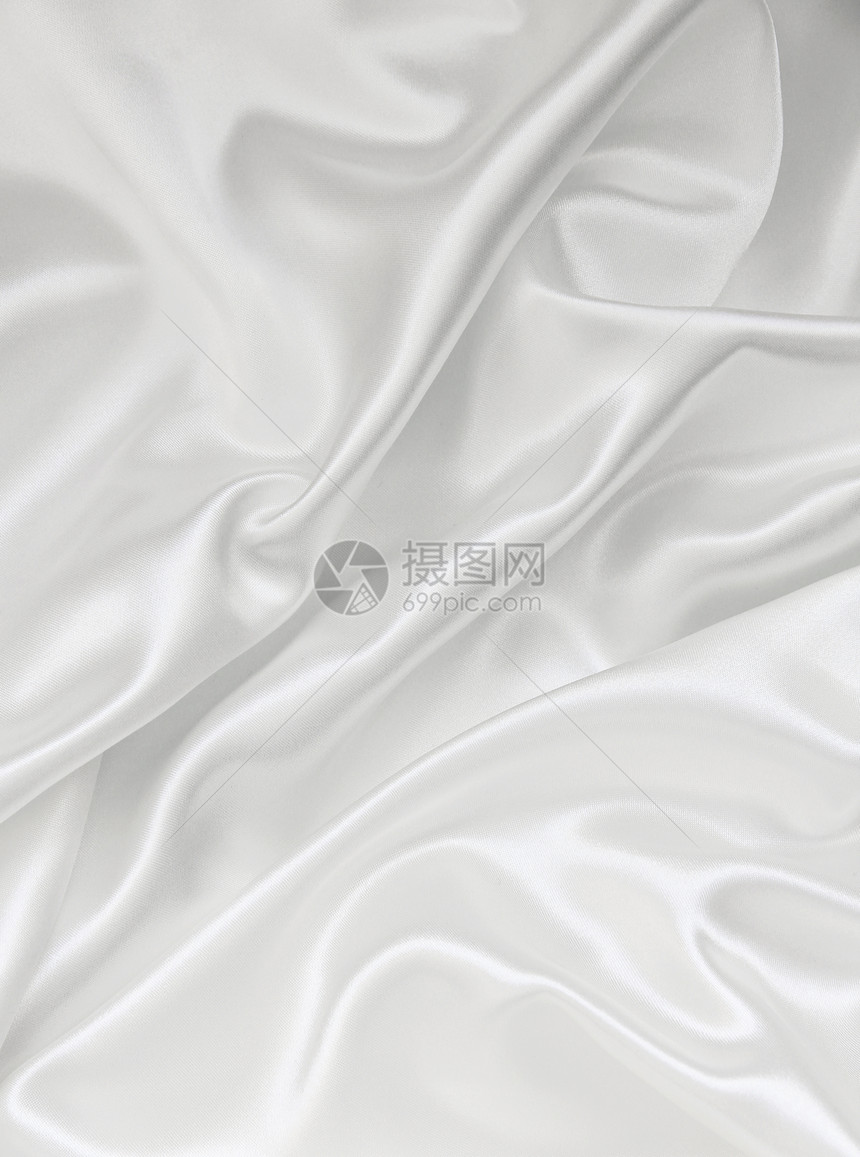 平滑优雅的白色丝绸作为背景涟漪感性材料纺织品布料银色折痕曲线婚礼新娘图片
