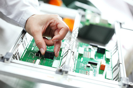 电子组件组装电脑工作芯片焊接元件技术电路板工程工程师焊机背景图片