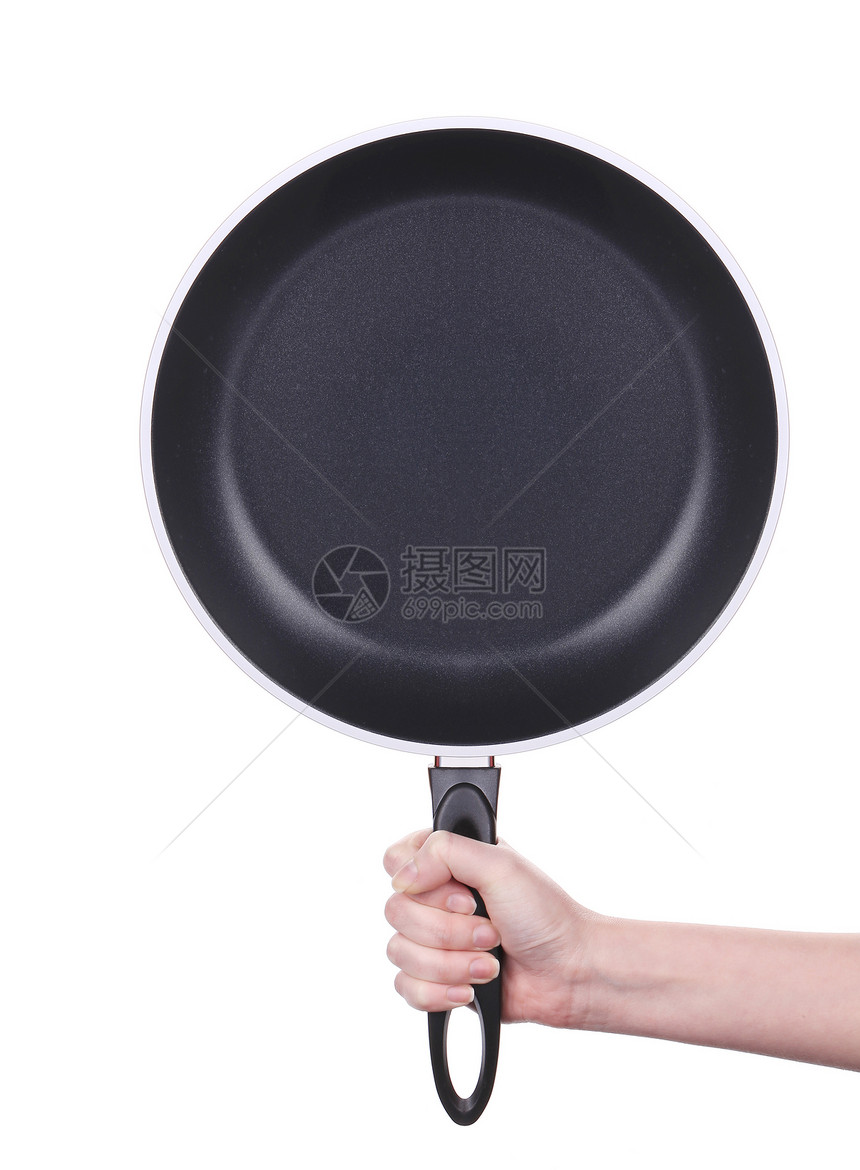 手拿着一个黑煎锅工具工人男人白色厨师油炸黑色烹饪平底锅食物图片