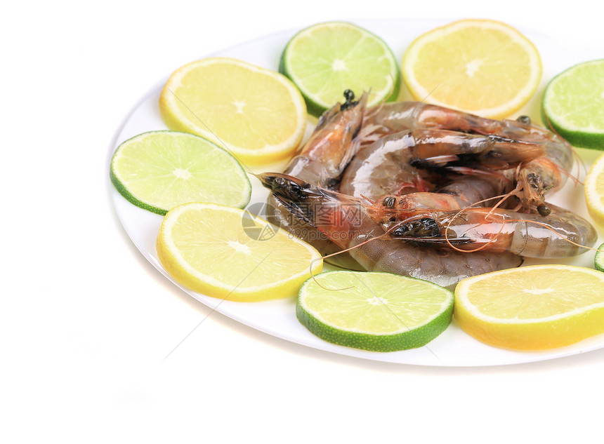 盘子里有生虾食物绿色柠檬午餐甲壳海鲜养殖贝类饮食白色图片