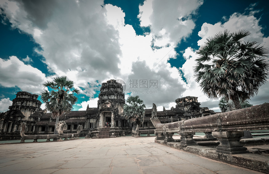 柬埔寨暹粒的和Angkor Wat高棉建筑群岩石历史佛教徒旅行微笑蓝色废墟雕塑上帝天空图片