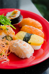 混合寿司海鲜盘子白色海苔美味食物海藻红色菜单背景图片