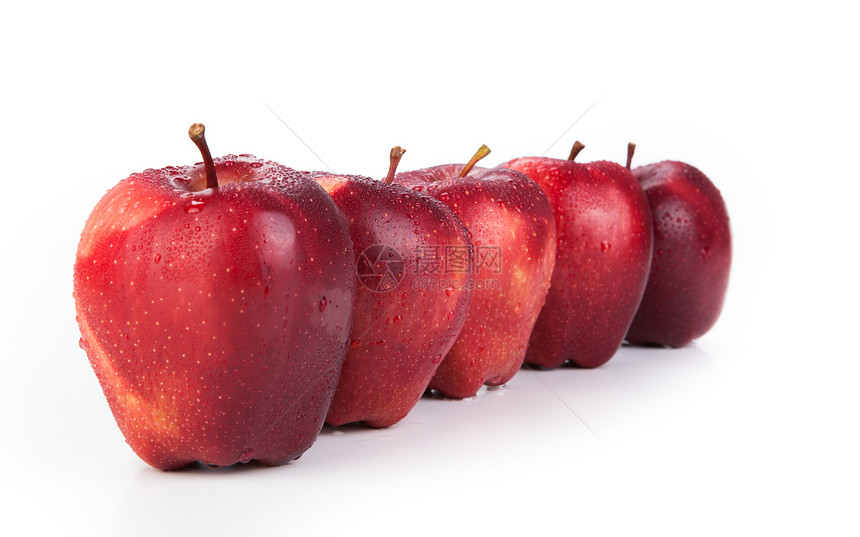 排成一排的木瓜苹果红色甜点味道牙齿水果烹饪栗色图片