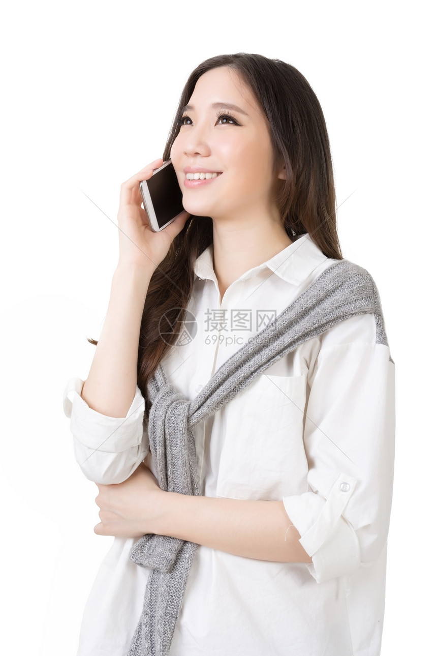 亚裔年轻女子来打个电话女士技术微笑魅力女性手机幸福生活图片