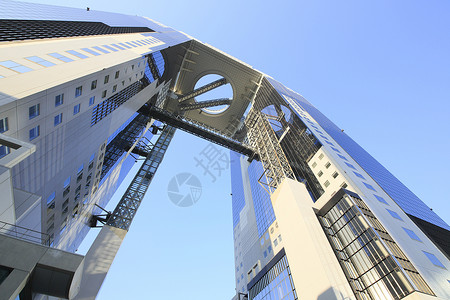 美高梅建筑日本大阪的蓝天空和美田天楼商业地点建筑城市地标建筑学蓝色办公室摩天大楼蓝天背景