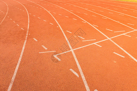 红色马场带白线的田径车道曲线场地运动短跑操场橡皮足球竞赛比赛竞争背景