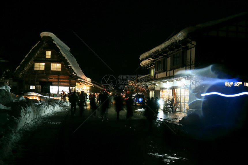 日本白川之光照亮场景旅游建筑遗产观光游客历史性地标历史旅行图片