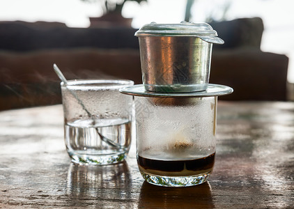 杯子滴水素材越南滴水咖啡酿造煮沸技术美食咖啡店桌子白色咖啡玻璃牛奶背景
