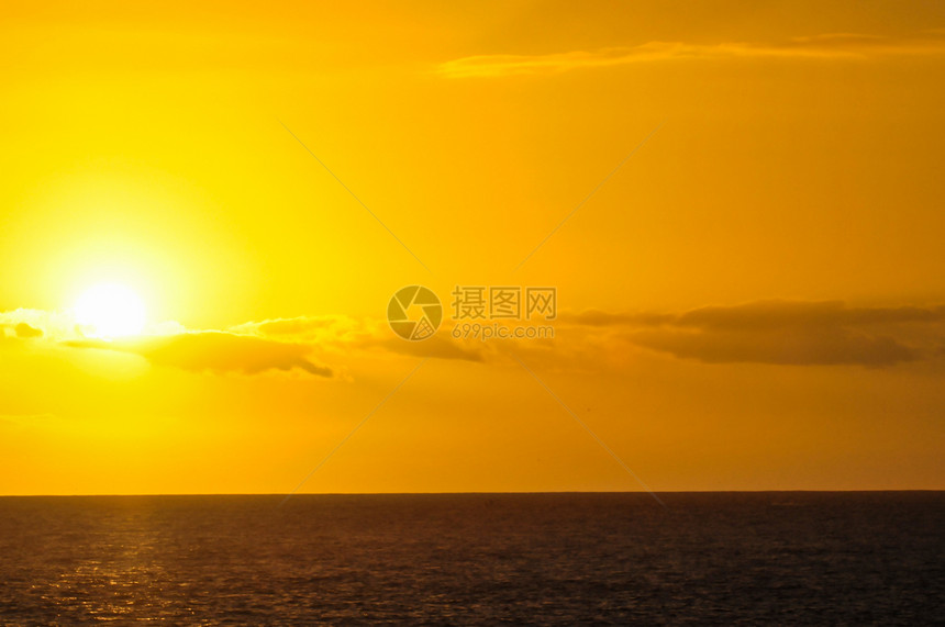 热带热带光辉日落地平线太阳海洋海滩天空日出阳光图片