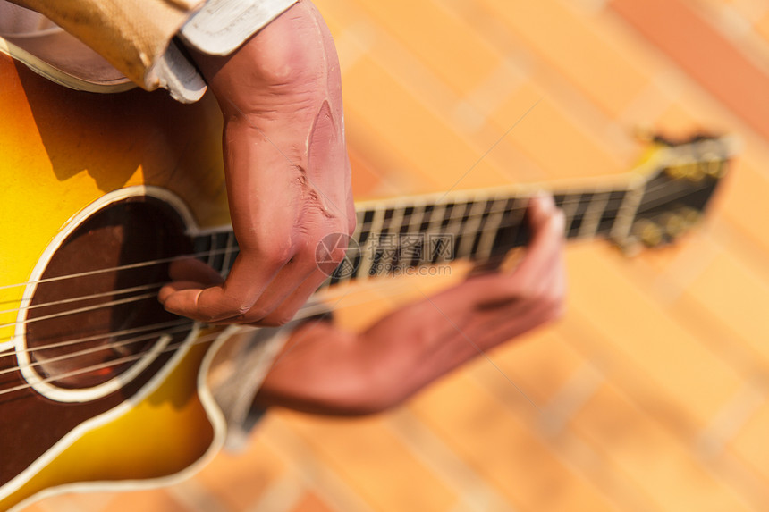 吉他玩家乐器岩石声学蓝调艺术家男人音乐家字符串娱乐艺术图片