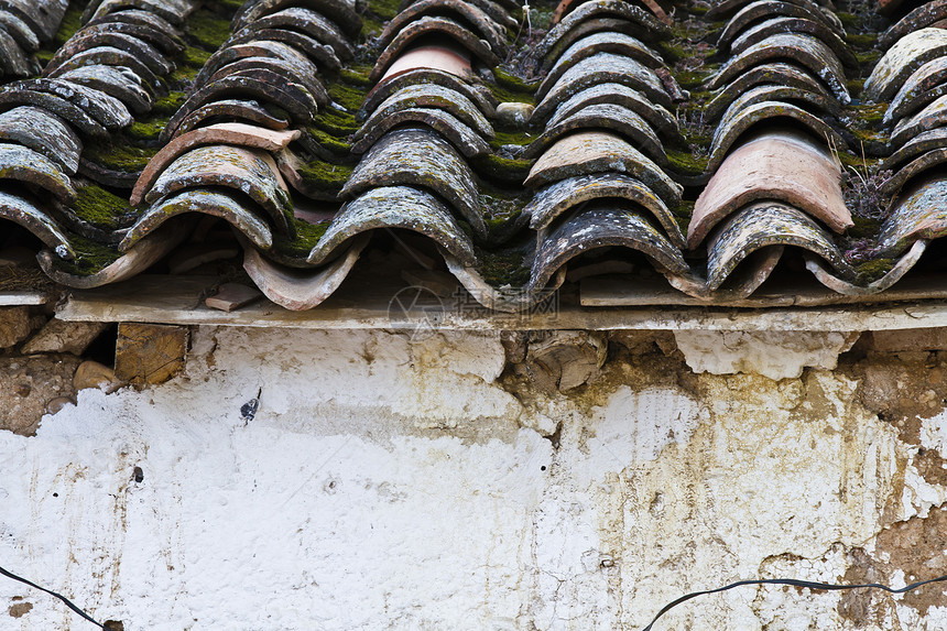 屋顶黏土砖的细细建筑材料橙子陶瓷天空建筑学条纹制品瓷砖石板图片