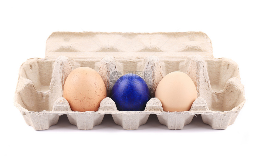 纸板盒上东西蛋和新鲜鸡蛋图片