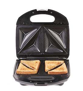 打开三明治三明治烤面包机加面包片厨具静物早餐厨房用具电器配件器具黑色食物背景