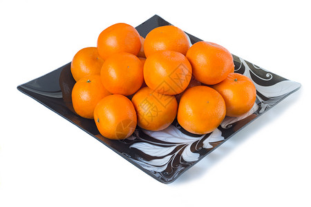在白色背景的玻璃碗里 盛大的成熟橘子维生素芳香产品饮食盘子甜点深色果汁水果食物背景图片