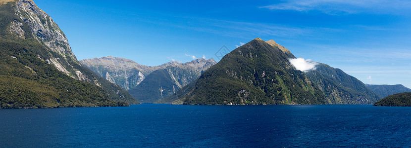 戌亥之交新西兰令人怀疑的声音之交组织悬崖山脉场景旅行全景天空冒险蓝色峡湾旅游背景