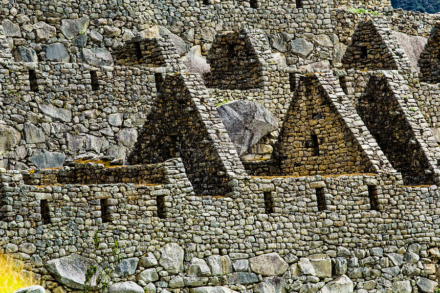秘鲁安第斯山脉古老的印加城市岩石建筑历史建筑学天空游客旅游马丘蓝色废墟图片