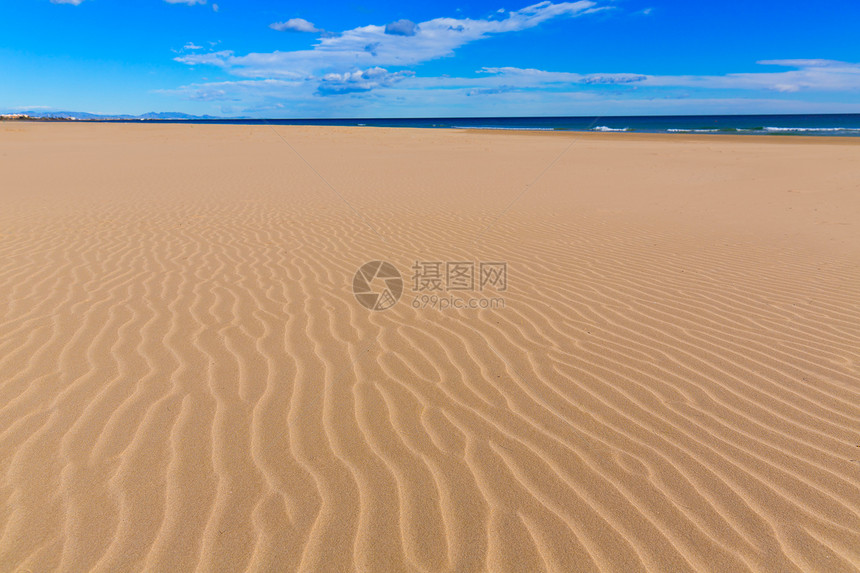 西班牙巴伦西亚Berenguer海滩蓝色旅游晴天天堂社区村庄天空海洋海岸线白色图片