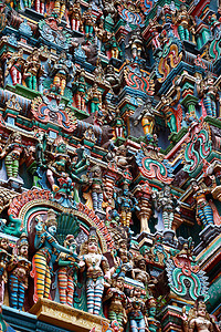 梅纳克希神庙Kali形象 印度印度神庙Gopura塔上的雕塑 印度Menakshi寺 Madurai 泰米尔纳德邦宽慰寺庙建筑学雕像上帝石头背景