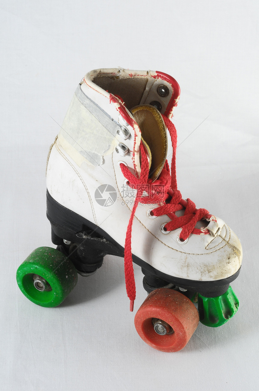 消耗的滚式滑板蕾丝轮子孩子们旱冰滑冰鞋带溜冰者孩子运动乐趣图片