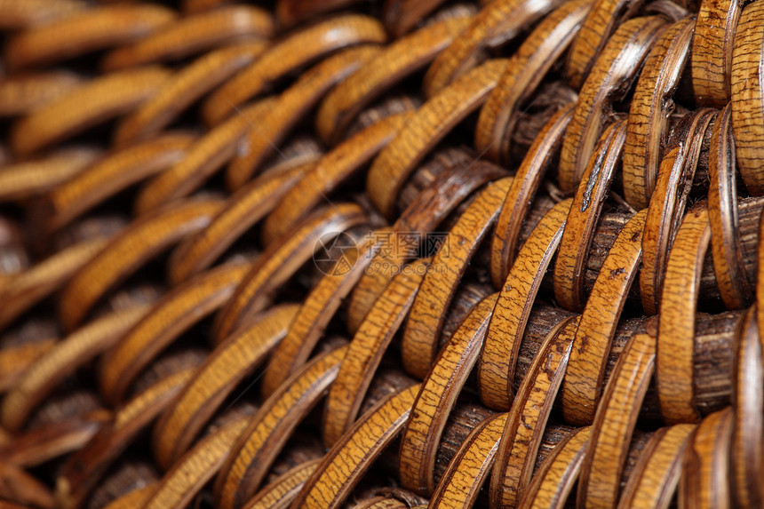 宏中连接的大鼠纤维详情棕褐色线条细绳木头酒吧宏观编织手工芦苇墙纸图片