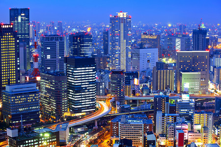 夜里大阪市风景景观建筑学公司建筑市中心摩天大楼场景城市建筑物商业背景