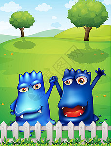 两只蓝色木鱼木篱旁有两只蓝色怪兽设计图片