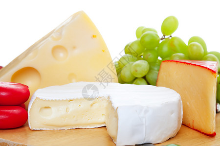 胡达亚尔奶酪品种红色食物奶制品美食羊乳绿色芝士白色自助餐水果背景