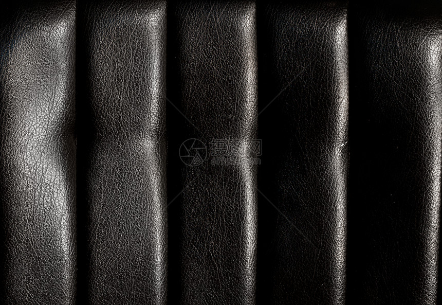 用于纹理的黑色皮革纺织品艺术质量隐藏座位奢华奶牛衣服织物材料图片