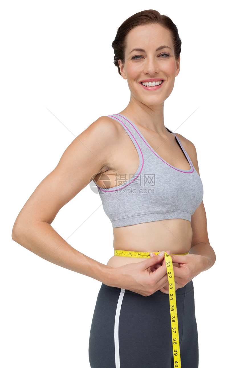 腰部健壮女子的肖像周长数字身体双手棕色卷尺护理运动服测量调子图片
