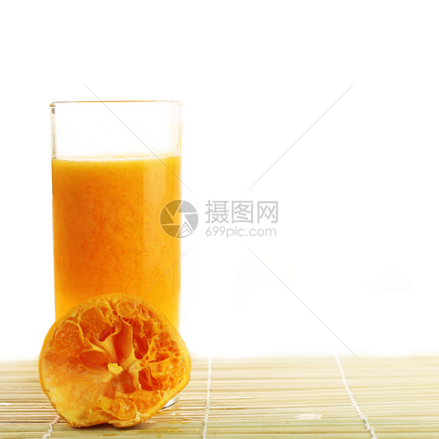 杯子里新鲜橙汁水果摄影食物果汁吸管液体健康饮食玻璃橙子图片